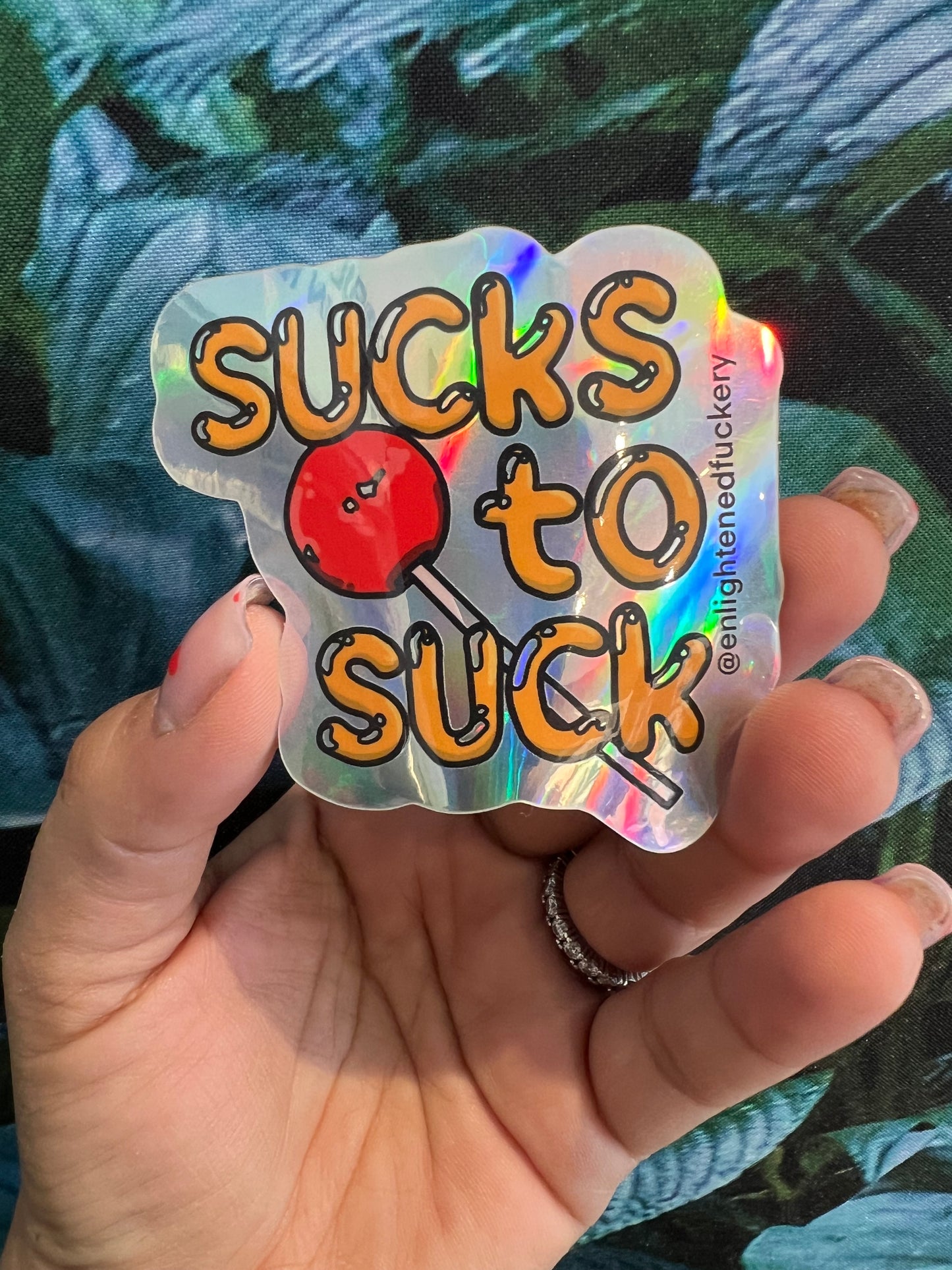 ENLIGHTENED FUCKERY SUCKS TO SUCK HOLO STICKER
